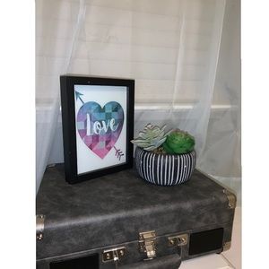 Multi-color “LOVE” sign.